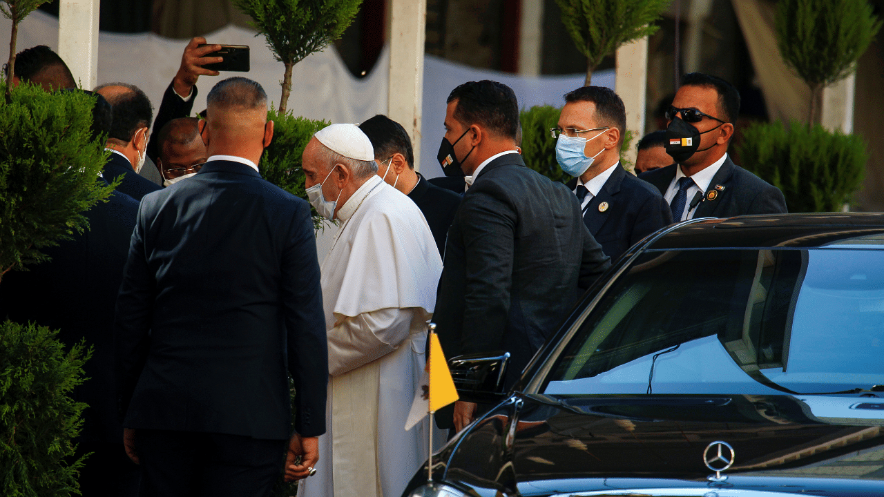 Pope Francis is pictured as he arrives to meet with Iraq's top Shi'ite cleric, Grand Ayatollah Ali al-Sistani, in Najaf, Iraq. Credit: Reuters Photo