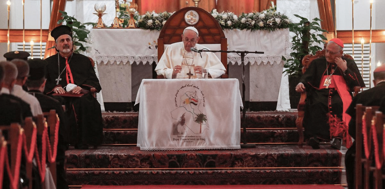 Pope Francis (C) delivers a sermon at the Syriac Catholic Cathedral of Our Lady of Salvation (Sayidat al-Najat) in Baghdad at the start of the first ever papal visit to Iraq. Credit: AFP Photo