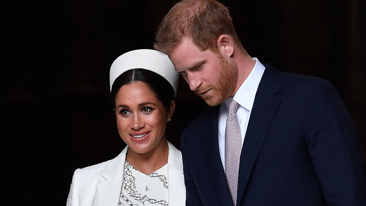 Britain's Prince Harry, Duke of Sussex (R) and Meghan, Duchess of Sussex. Credit: AFP Photo