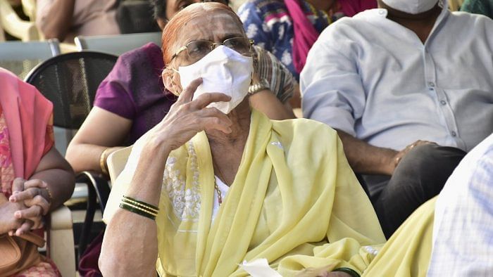Senior citizens wait for their turn to receive the first dose of Covid vaccine, during the second phase of the countrywide inoculation drive, in Bengaluru, Thursday, March 4, 2021. Credit: PTI Photo