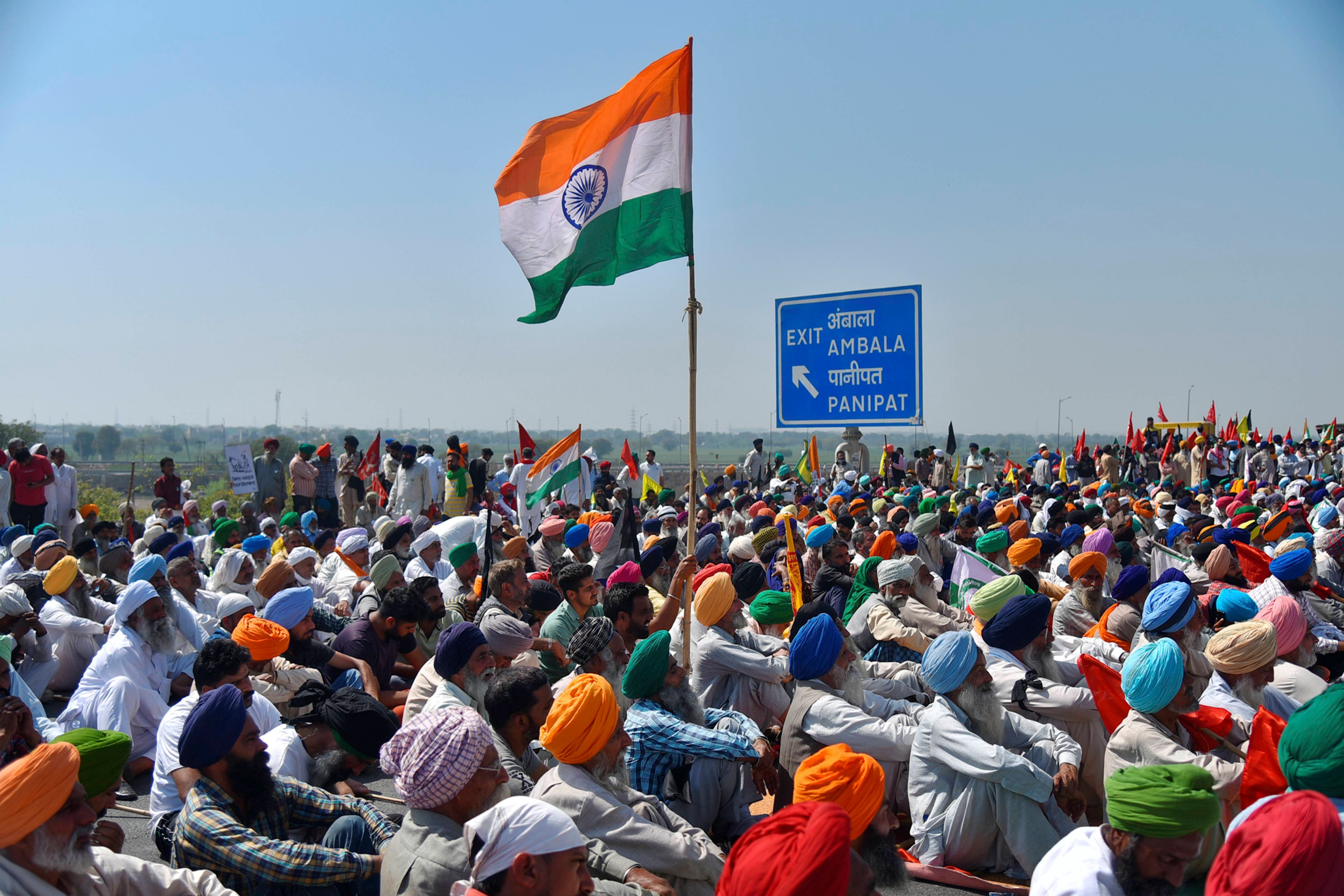 Farmers during 'Kisan Ekta Morcha' to mark the 100th day of the ongoing protests against the new farm reform laws, at KMP Expressway near Kundli in Haryana, Saturday, March 6, 2021. Representative image/Credit: PTI Photo