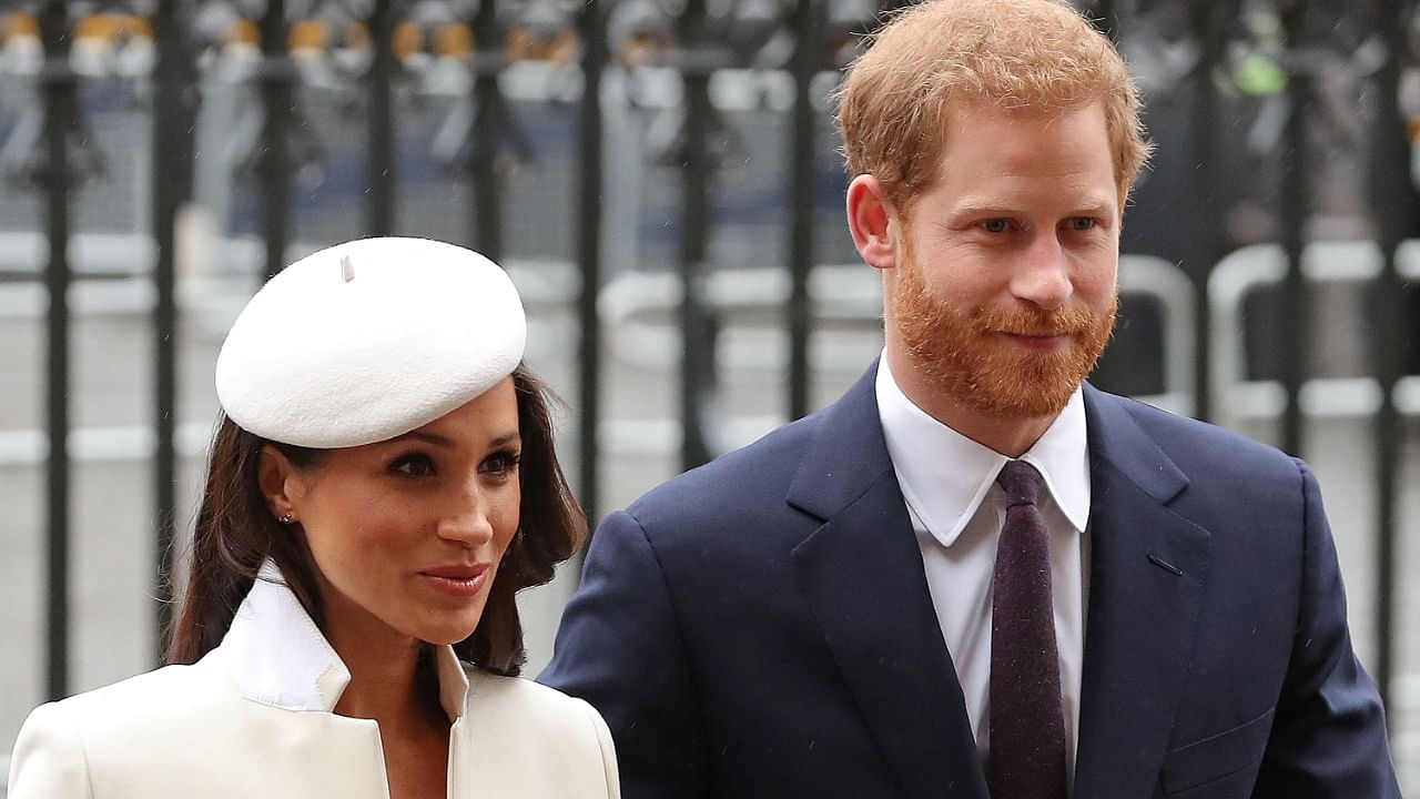 Britain's Prince Harry (R) and Meghan Markle. Credit: AFP File Photo