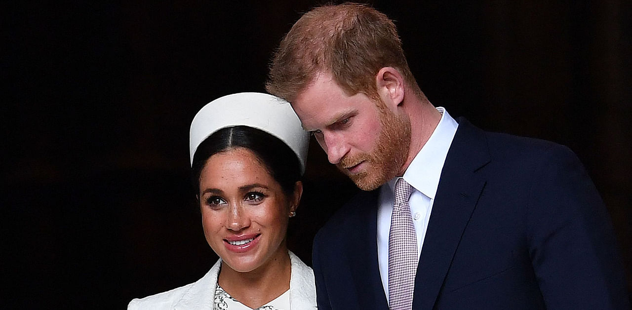 Britain's Prince Harry and his wife Meghan Markle. Credit: AFP File Photo