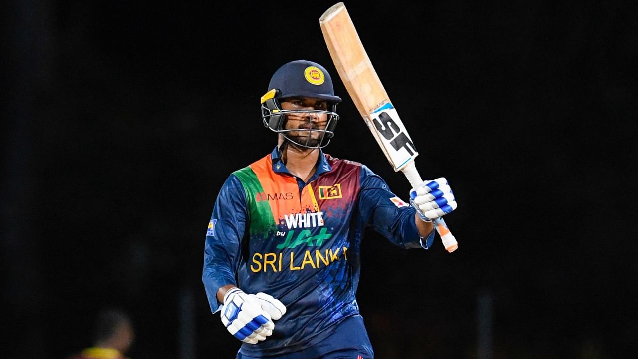Dinesh Chandimal of Sri Lanka celebrates his half century during the 3rd and final T20i match between Sri Lanka and West Indies at Coolidge Cricket Ground on March 7, 2021 in Coolidge, Antigua and Barbuda. Credit: AFP Photo