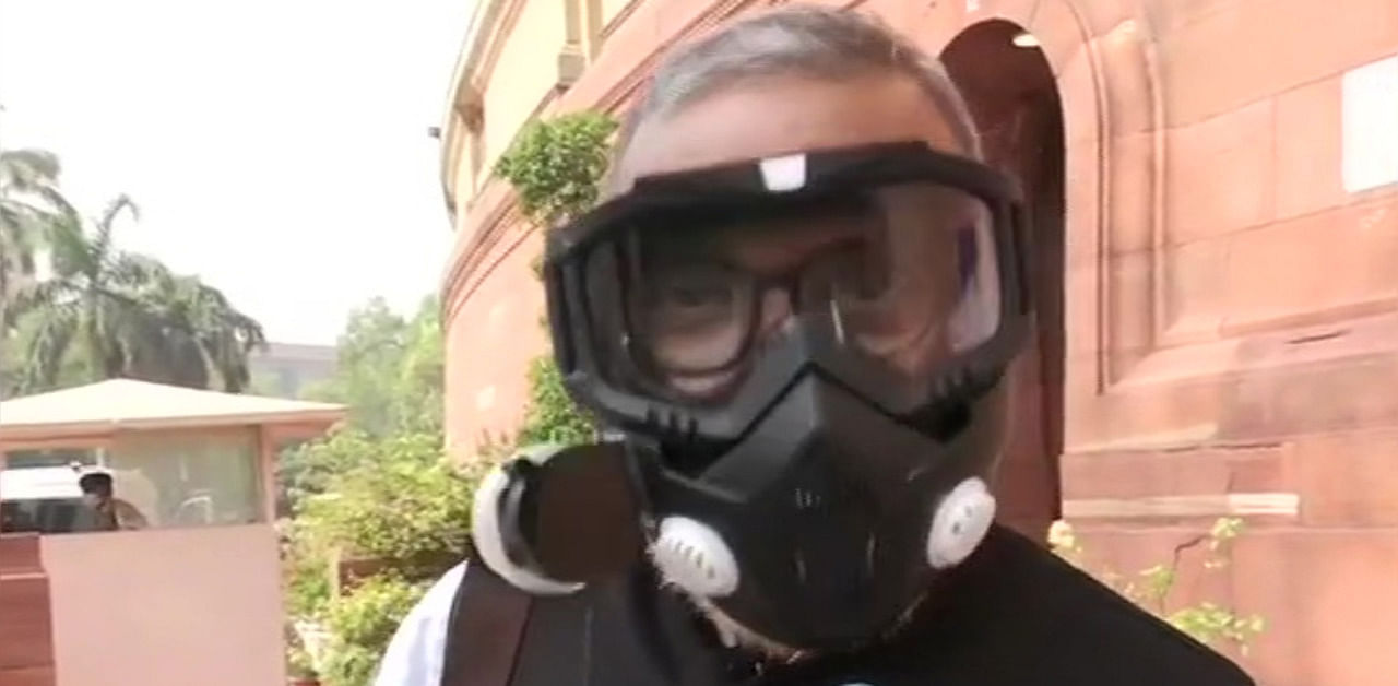 Rajya Sabha MP Dr Narendra Jadhav wearing HEPA filter face mask. Credit: Twitter Photo/@ANI