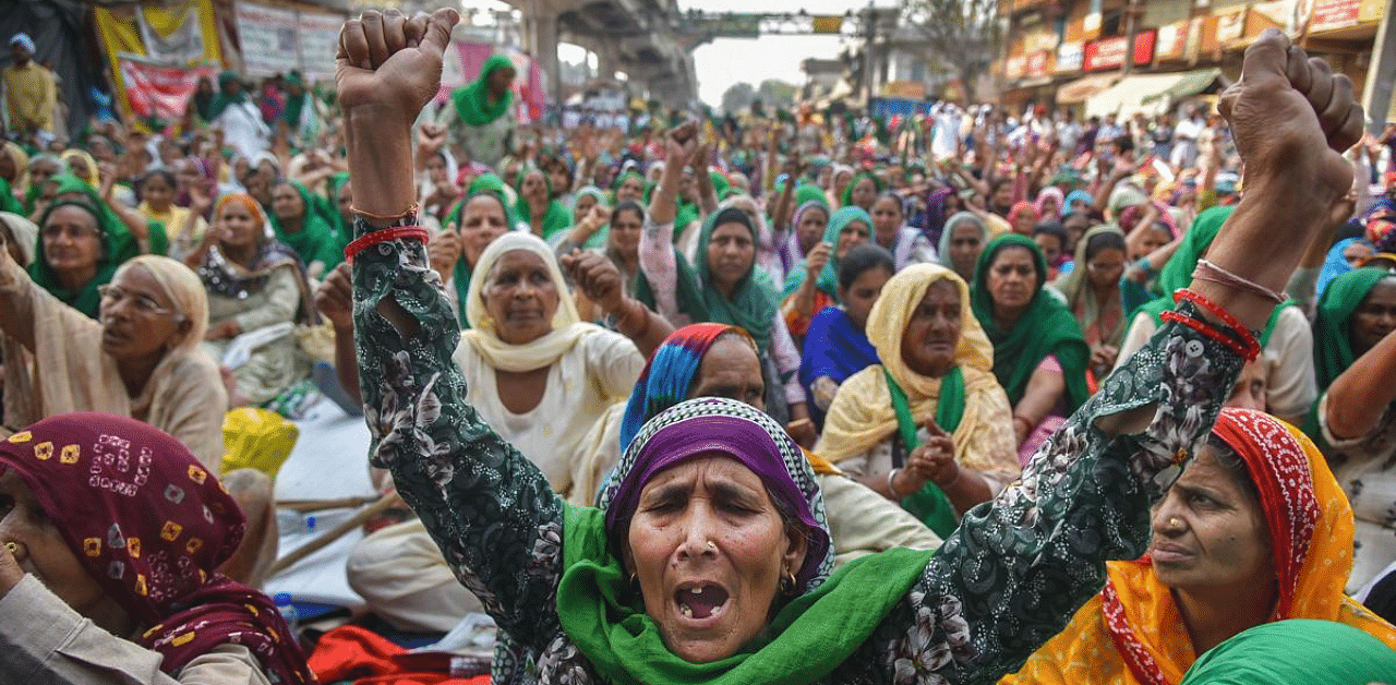 Women protest against new farm laws. Credit: PTI Photo