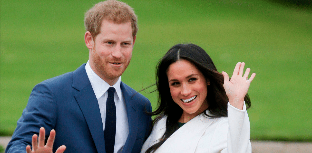 Prince Harry and his wife Meghan Markle. Credit: AFP Photo