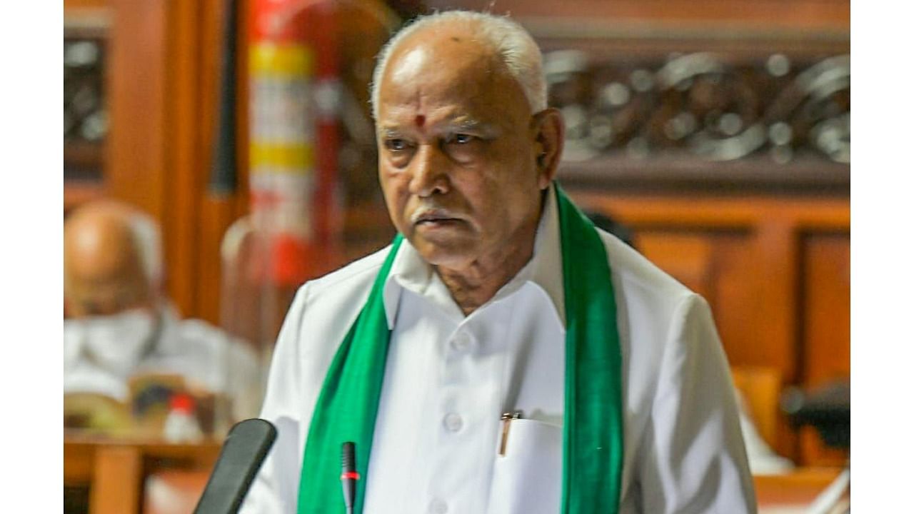 Karnataka Chief Minister B S Yediyurappa presents the State Budget 2021-22 in the Vidhana Soudha, Bengaluru. Credit: PTI Photo