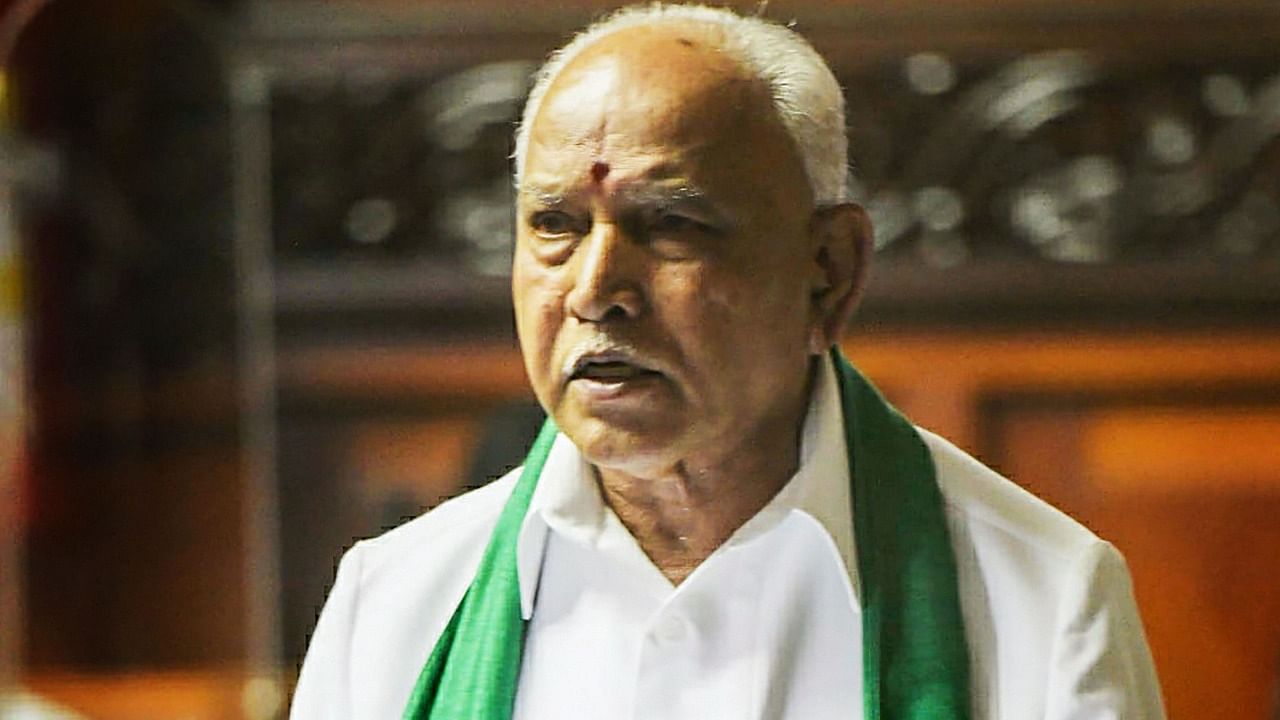 Karnataka Chief Minister B S Yediyurappa presents the State Budget 2021-22 in the Vidhana Soudha, Bengaluru. Credit: PTI Photo