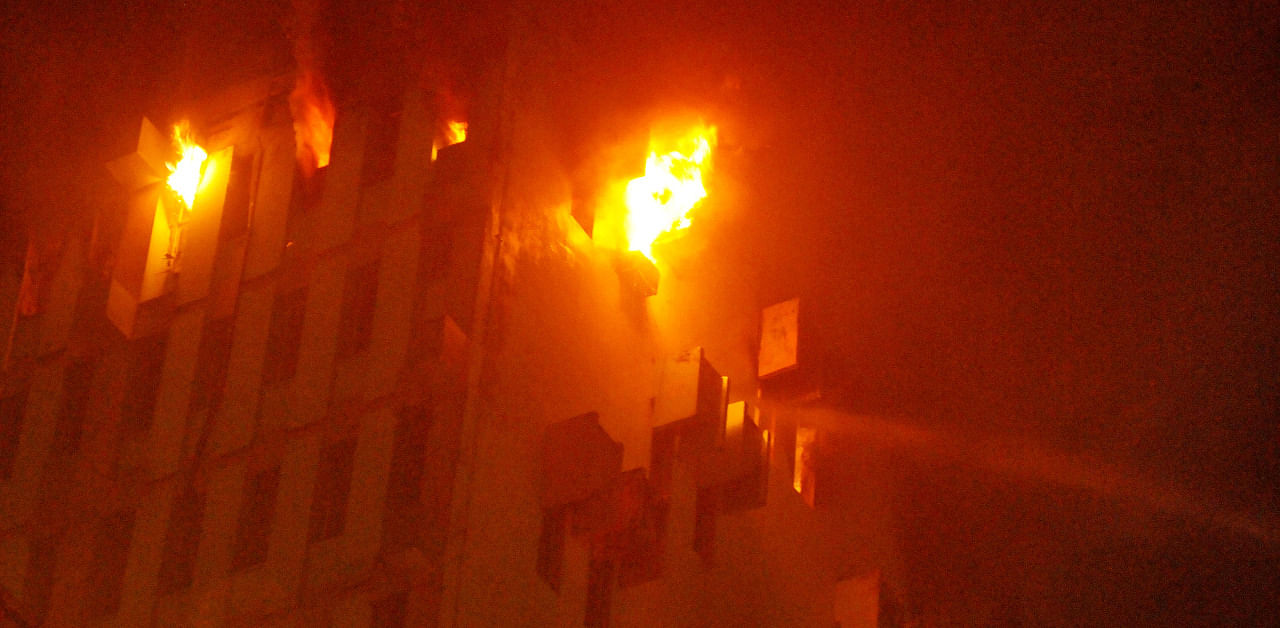 Fire breaks out at the 12th floor of a multi-storeyed building in Kolkata. Credit: PTI Photo