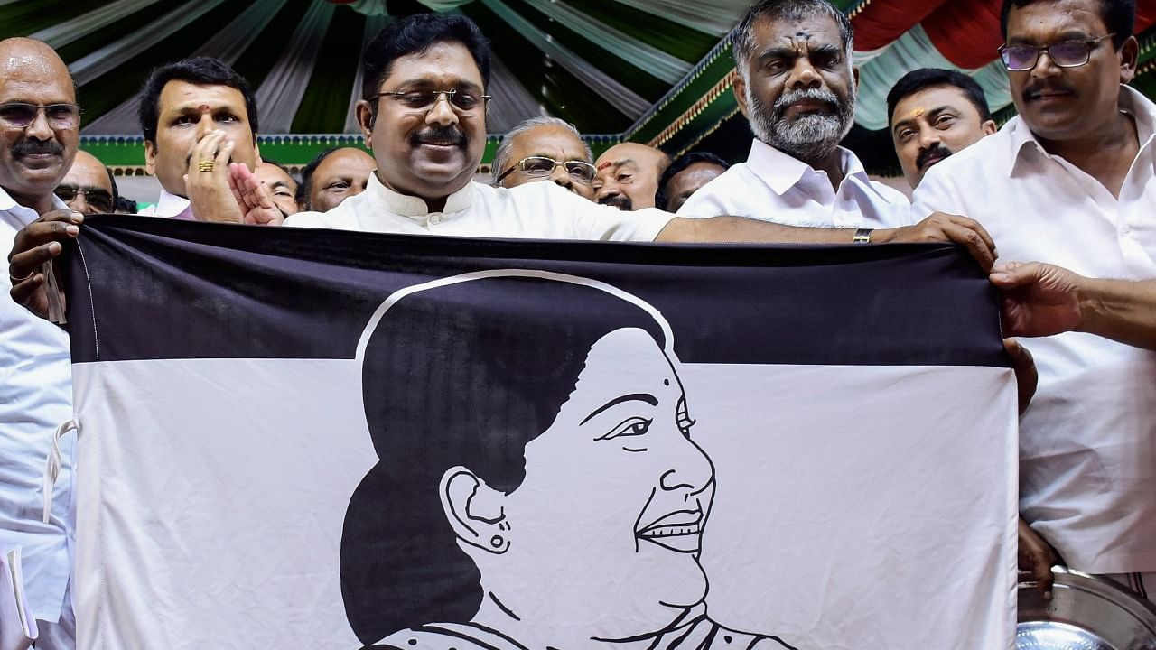 Sidelined AIADMK leader TTV Dhinakaran launches the party flag which consists of a photo of former TN chief minister J Jayalalithaa. Credit: PTI File Photo