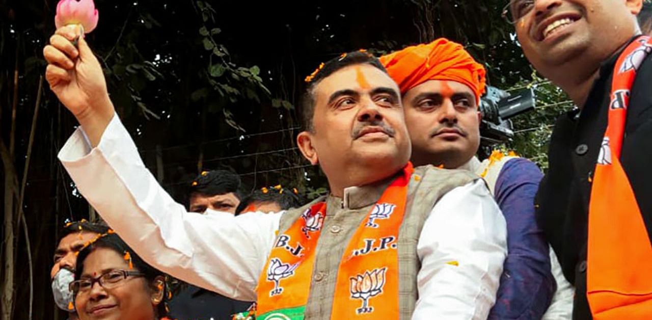  BJP leader Suvendu Adhikari during a roadshow. Credit: PTI Photo