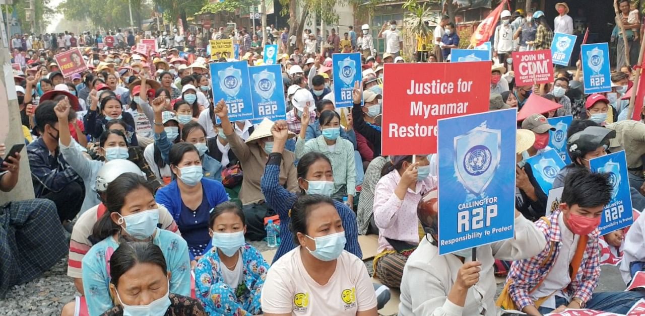 People take part in a sit-in protest in Mandalay, Myanmar. Credit: AFP Photo