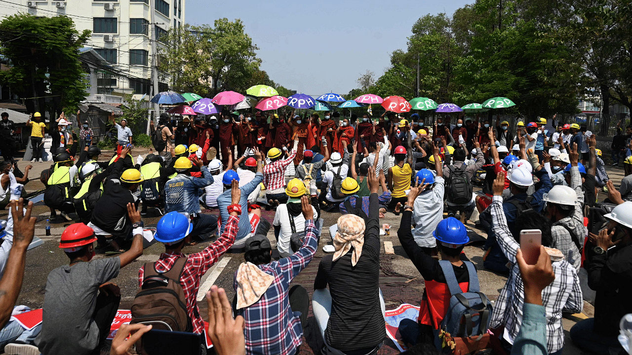 Protesters take part in a demonstration against the military coup in Yangon. Credit: AFP Photo