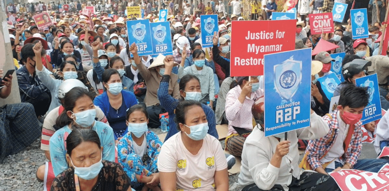 People take part in a sit-in protest in Mandalay, Myanmar. Credit: Reuters Photo