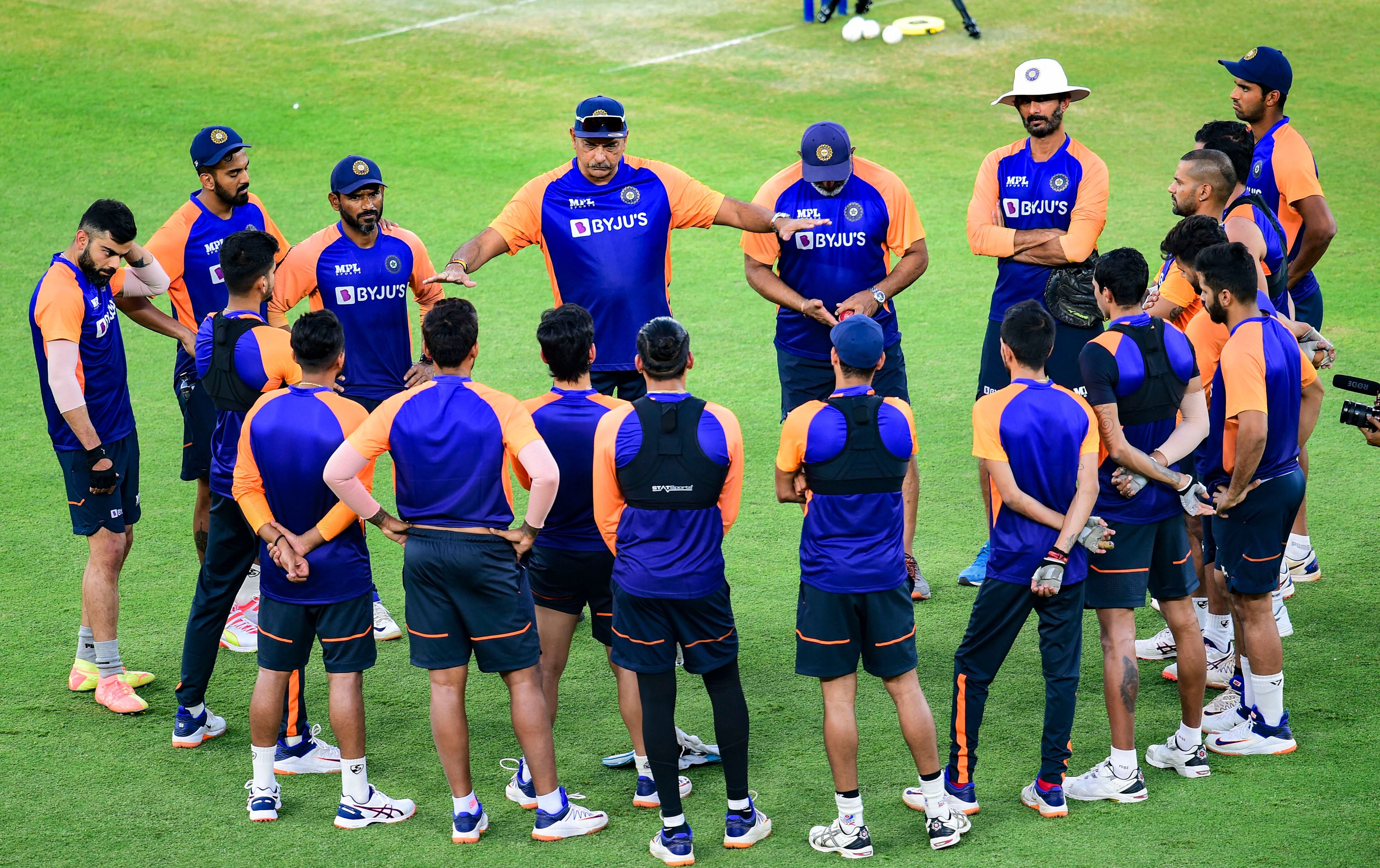 Indian cricket team head coach Ravi Shastri speaks to players and coaching staff during a training session. Credit: PTI Photo