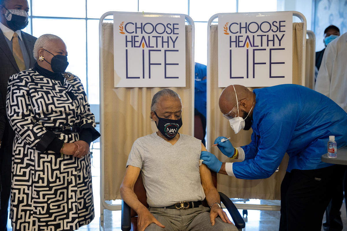 Rev. Al Sharpton receives a dose of the Pfizer-BioNTech vaccine against the coronavirus disease at NYC Health + Hospitals Harlem Hospital in the Manhattan borough of New York City, New York. Credit: Reuters photo.