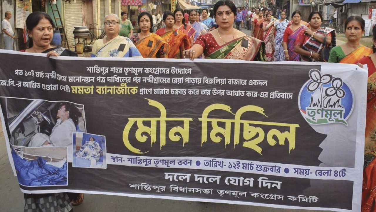 TMC supporters participate in a silent march condemining the alleged attack on West Bengal CM Mamata Banerjee in Nandigram, in Nadia district, Friday, March 12, 2021. Credit: PTI Photo