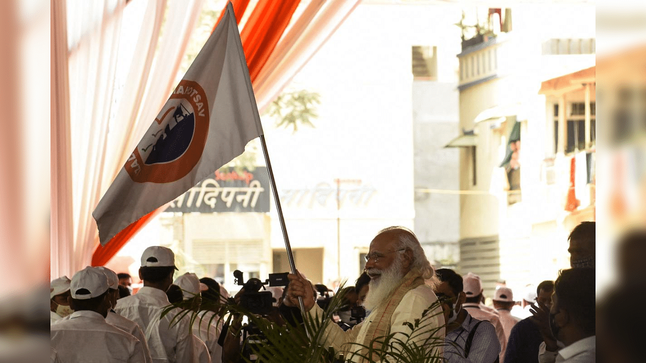 India's Prime Minister Narendra Modi (C) flags off Dandi March (Salt March) to commemorate the country's 75th year of independence, in Ahmedabad on March 12, 2021. Credit: AFP Photo