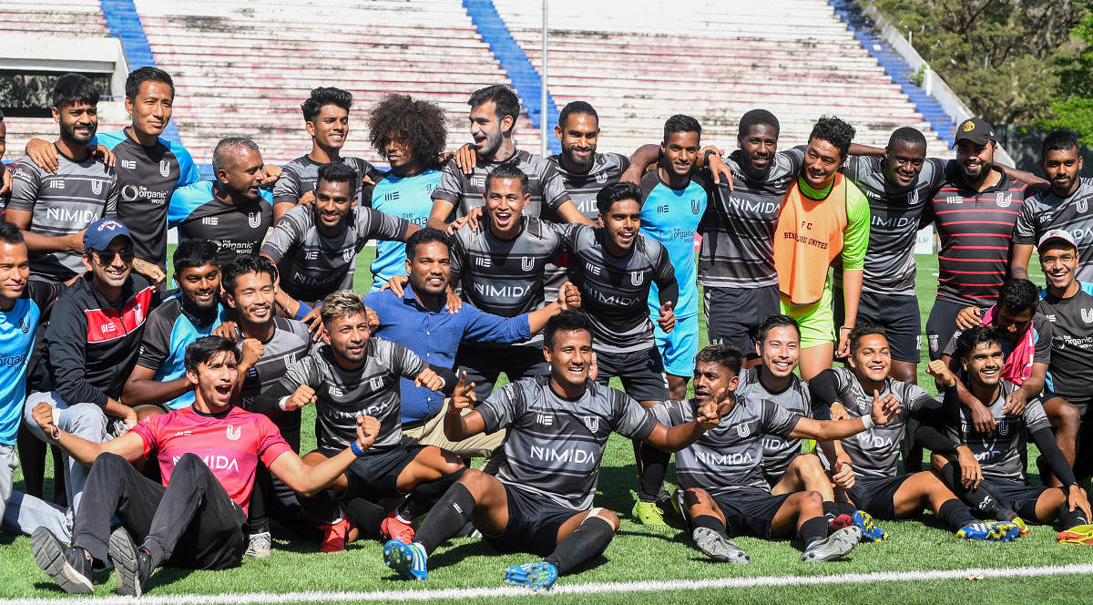 FC Bengaluru United players celebrate after their win over FC Deccan ensured them Super Division Football League title at the Bangalore Football Stadium in Bengaluru on Thursday. DH Photo/ S K Dinesh