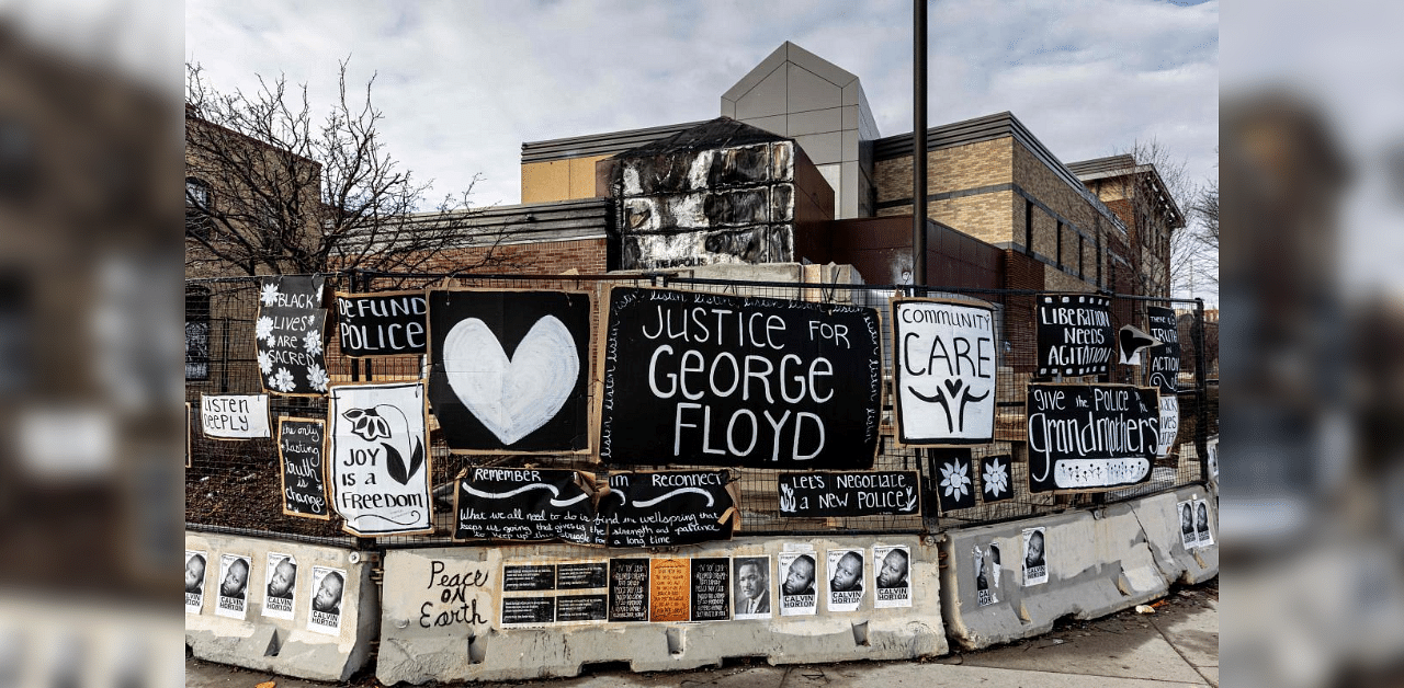 A general view is seen of the burned and destroyed Third Police Precinct on March 11, 2021 in Minneapolis, Minnesota, as the precinct building was burned May 2020 during the protests after the death of George Floyd. Credit: AFP photo. 