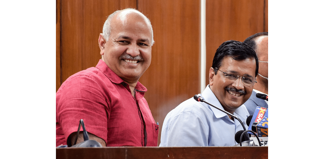 Delhi Chief Minister Arvind Kejriwal and Deputy Chief Minister Manish Sisodia address the media after presenting the Delhi Budget 2021-22. Credit: PTI Photo