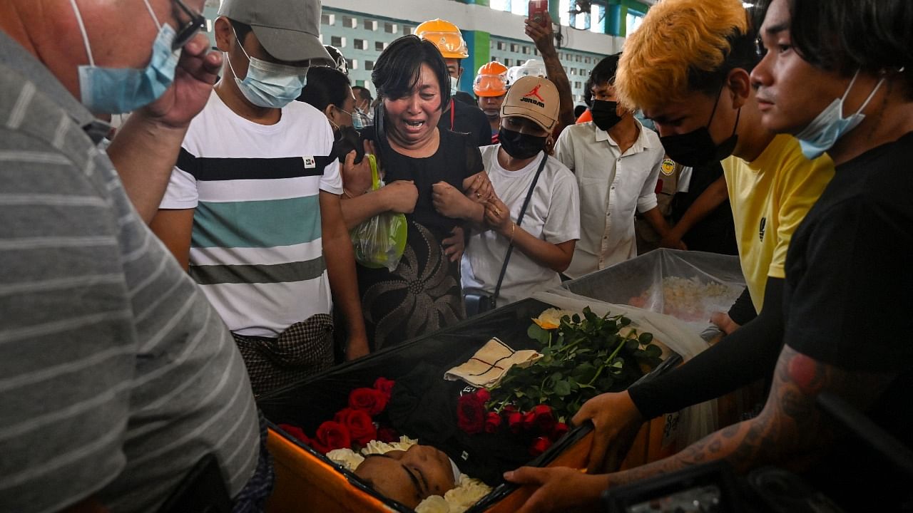 The mother of Chit Min Thu, a protester who died during a demonstration against the military coup in Myanmar. Credit: AFP Photo