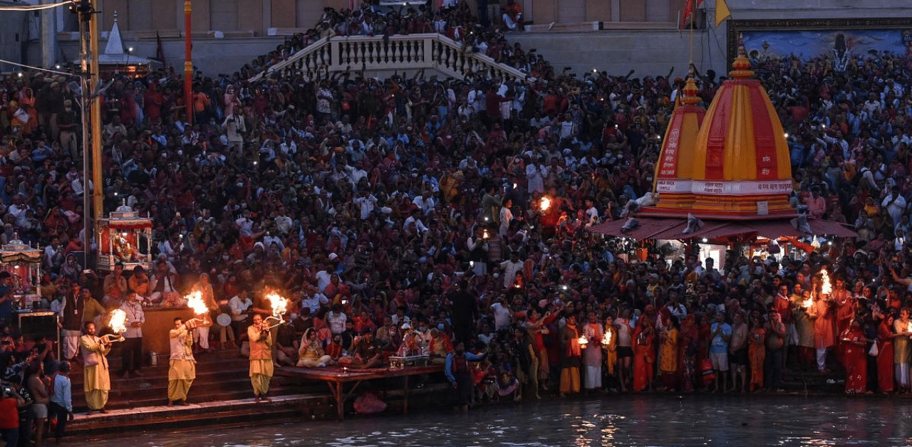 Hindu devotees attend evening prayers during the ongoing religious Kumbh Mela festival in Haridwar. Credit: AFP Photo
