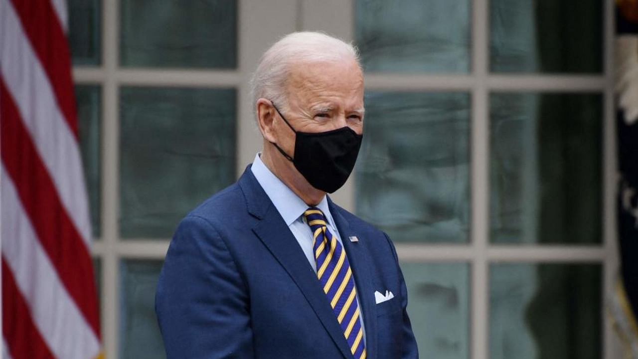 US President Joe Biden looks on during an event on the American Rescue Plan in the Rose Garden of the White House in Washington, DC. Credit: AFP