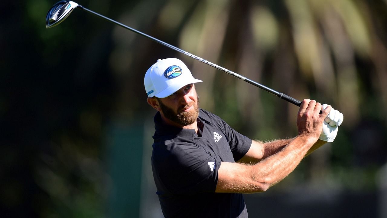 Dustin Johnson hits from the second hole tee box during the third round of The Genesis Invitational golf tournament at Riviera Country Club. Credit: USA Today Sports