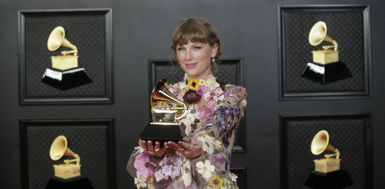 She also won it in 2010 for her album Fearless and again in 2015 for 1989. Credit: AFP Photo