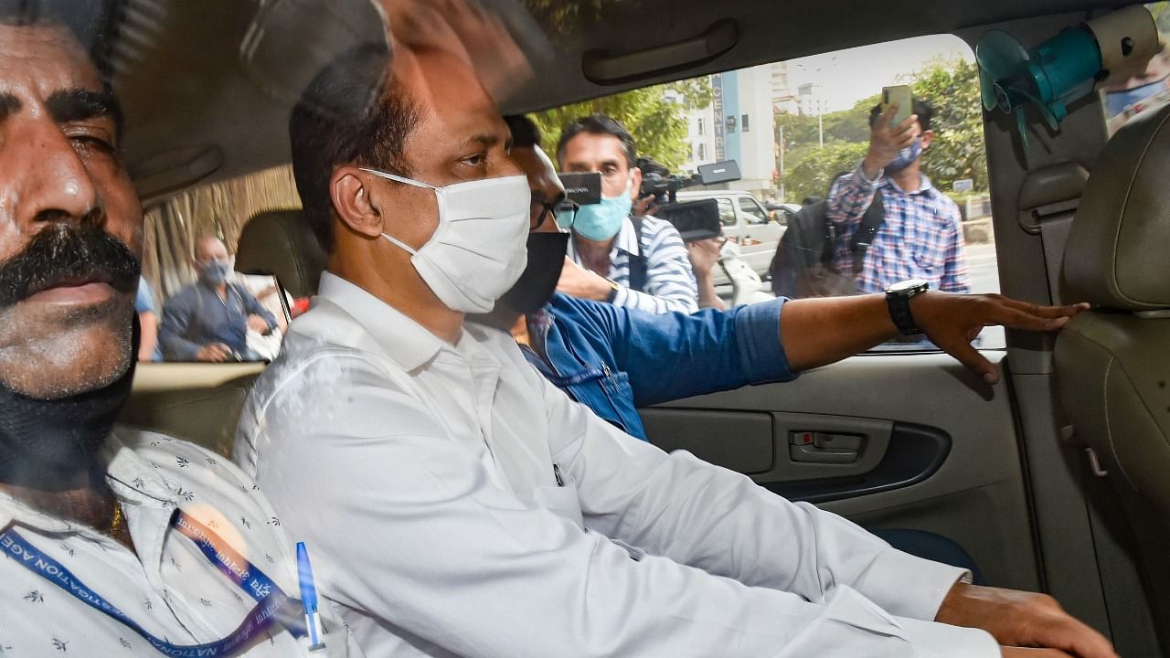 Mumbai Cop Sachin Vaze after being produced by National Investigation Agency (NIA) in a court following his arrest. Credit: PTI Photo