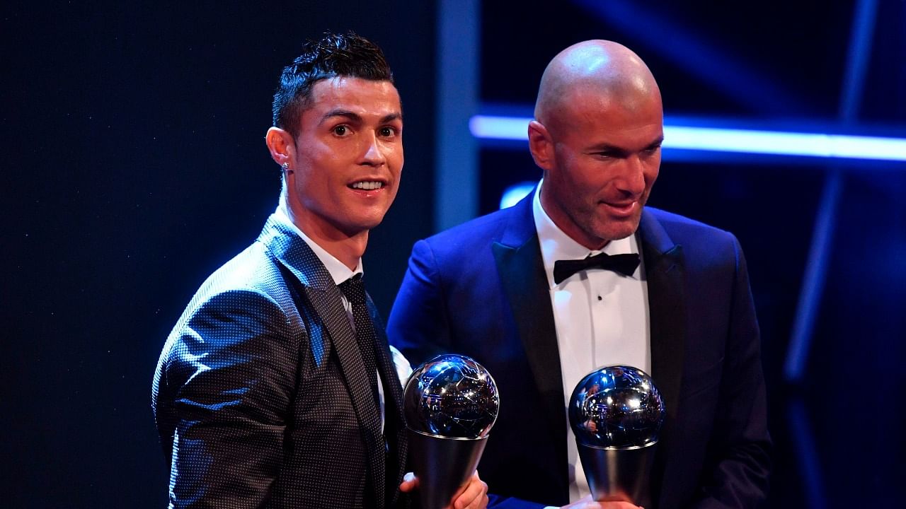 Former Real Madrid star Cristiano Ronaldo (L) and Real Madrid manager Zinedine Zidane. Credit: AFP File Photo