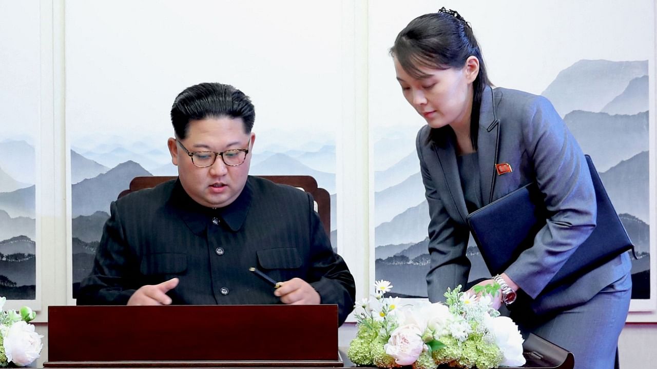 North Korea's leader Kim Jong Un (L) and his sister Kim Yo Jong (R). Credit: AFP File Photo