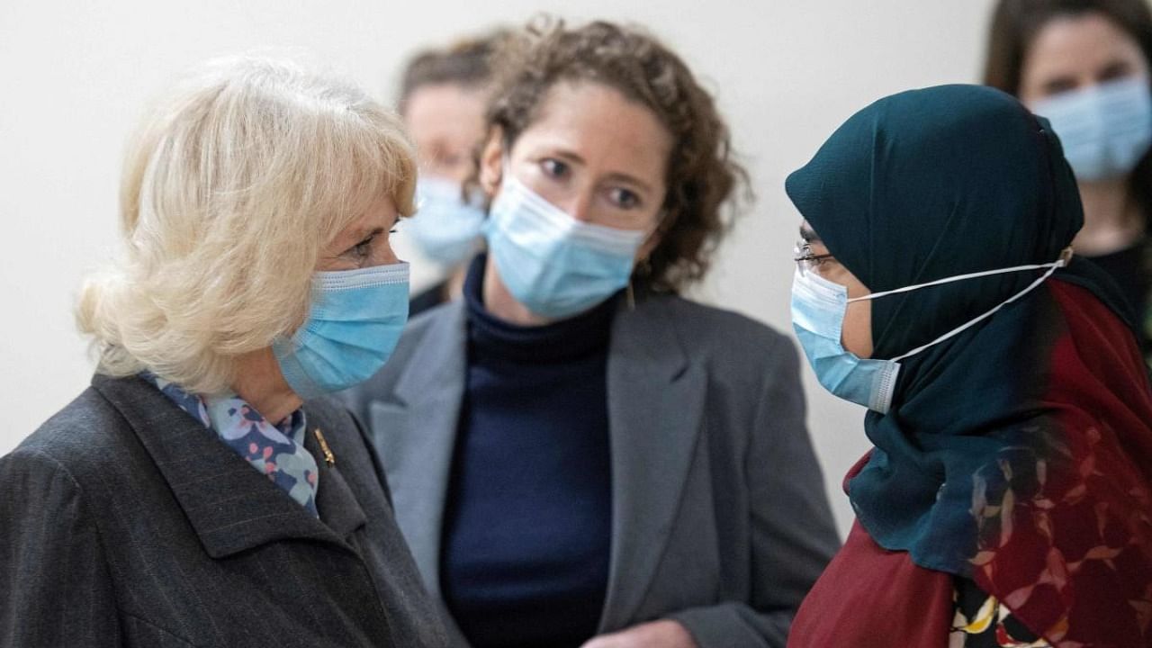 Britain's Camilla, Duchess of Cornwall, wearing a face covering, visit a temporary Covid-19 vaccination centre at Finsbury Park Mosque in east London. Credit: AFP.