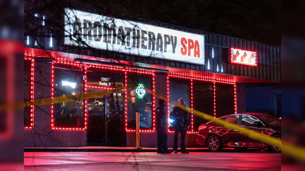  Law enforcement personnel are seen outside a massage parlor where a person was shot and killed on March 16, 2021, in Atlanta, Georgia. Credit: AFP Photo