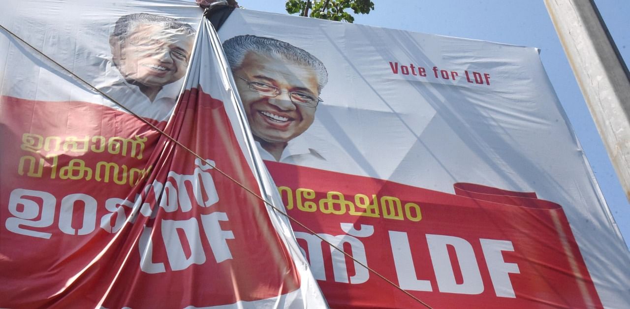 An election campaign banner of Kerala Chief Minister Pinarayi Vijayan. Credit: PTI Photo