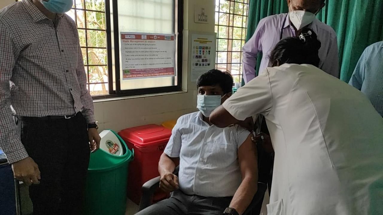 Udupi Deputy Commissioner G Jagadeesha receives the second dose of Covid-19 vaccination in Udupi. Credit: DH Photo.