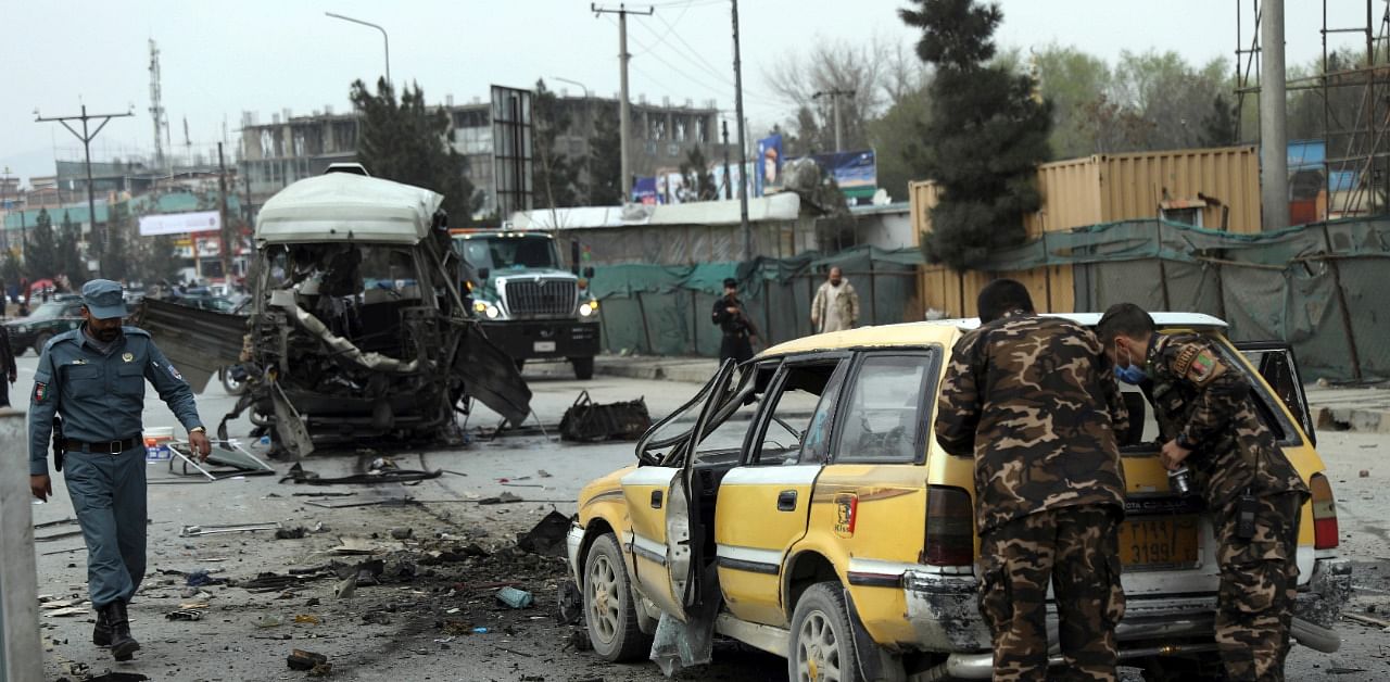 The blast hit a bus which was rented by the Afghan ministry of information and technology to transport employees. Credit: AP Photo