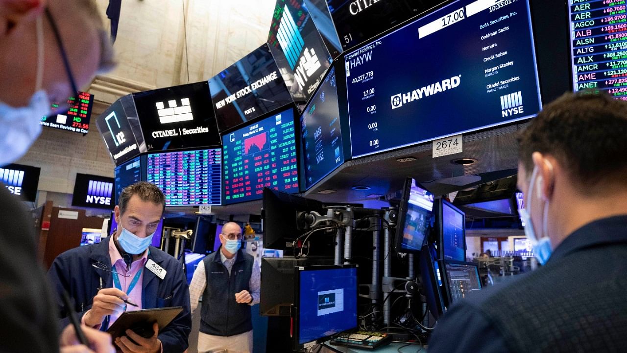 Traders work on the trading floor at NYSE. Credit: AP Photo