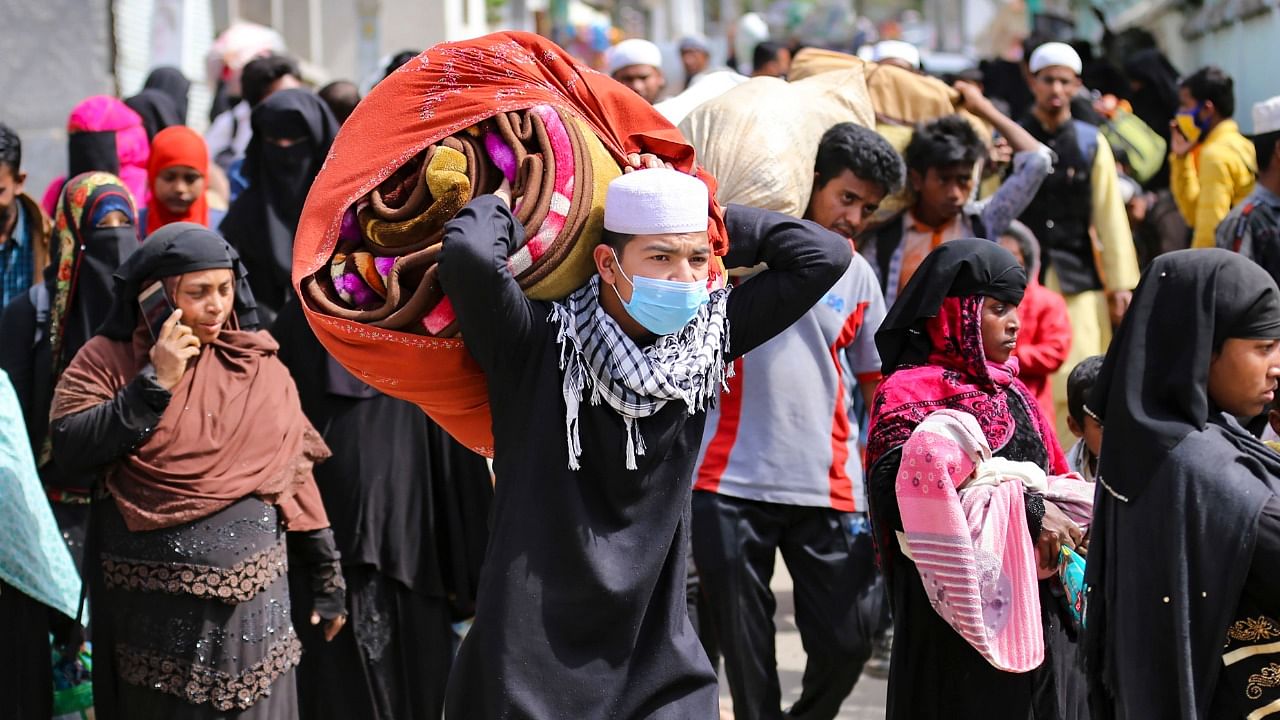 Rohingya Muslims leave their settlement for a centre following a police verification drive, in Jammu, Sunday, March 7, 2021. Credit: PTI File Photo