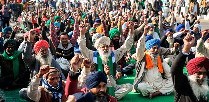 Farmers protesting at Delhi's borders. Credit: AFP Photo