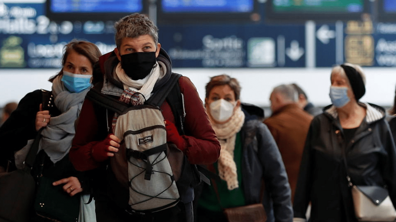 Passengers, wearing protective face masks, wait at Montparnasse railway station in Paris before a third lockdown imposed during a month-long on Paris and parts of the north after a faltering vaccine rollout and spread of highly contagious coronavirus disease variants in France, March 19, 2021. Credit: Reuters Photo