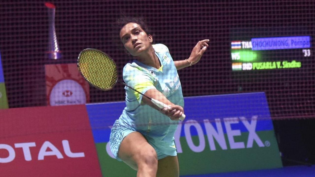 P V Sindhu plays a shot against Thailand's Pornpawee Chochuwong during the women's singles semi final match on day four of the All England Open Badminton Championships at the Utilita Arena in Birmingham. Credit: AP/PTI.