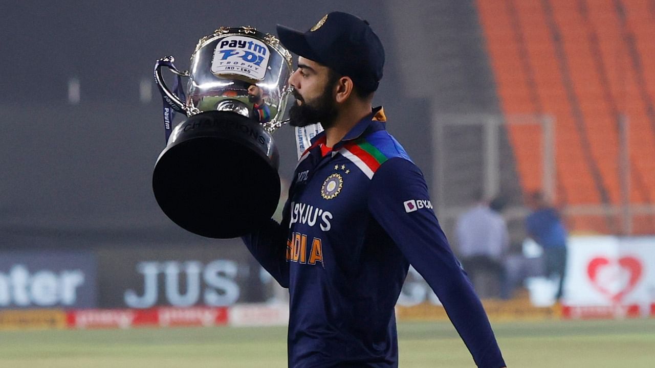 India's Virat Kohli celebrates winning the series with the trophy. Credit: Reuters