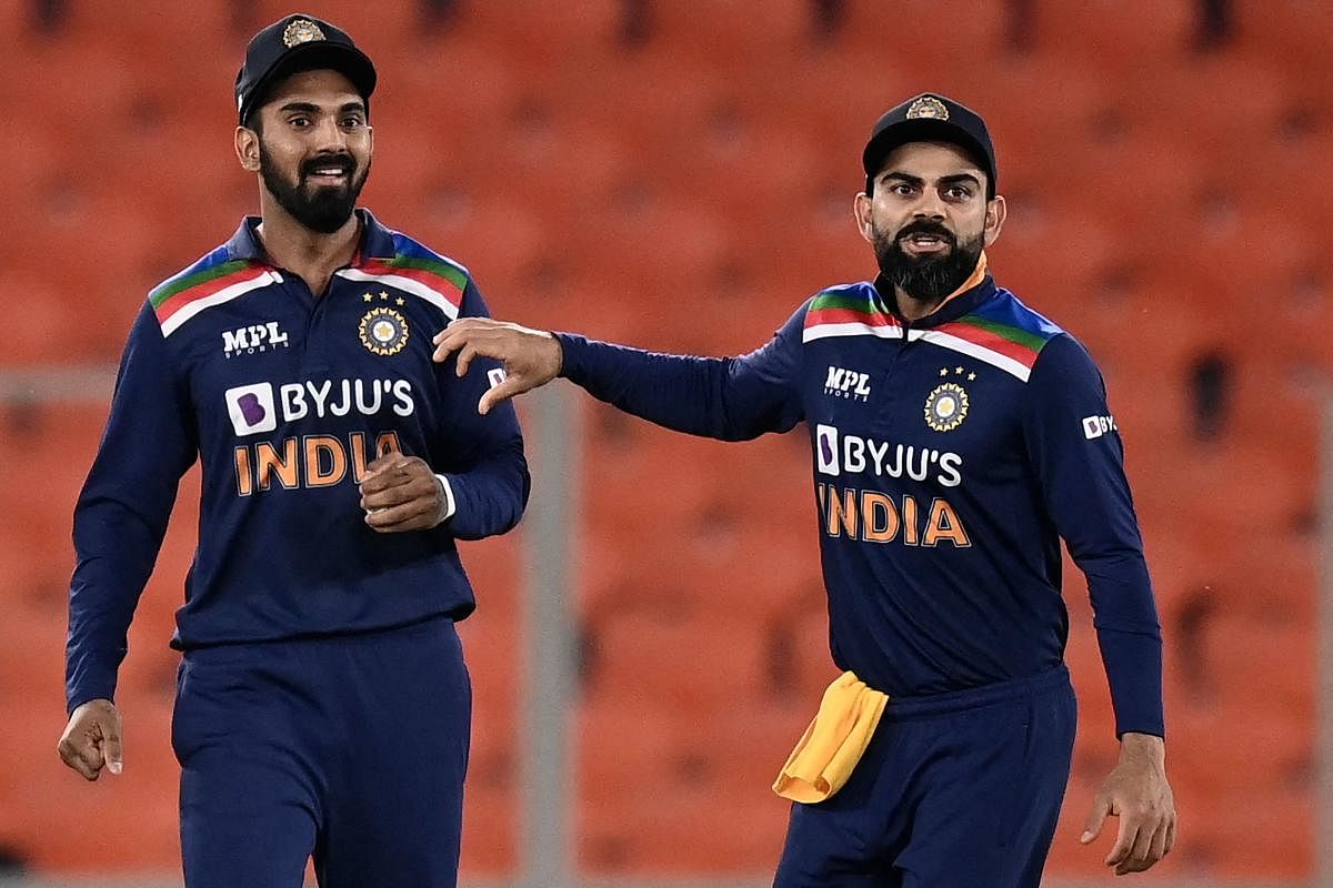 Virat Kohli (right) move up as opener might cost KL Rahul his spot in the team, especially when India choose to go with six bowlers. Credit: AFP