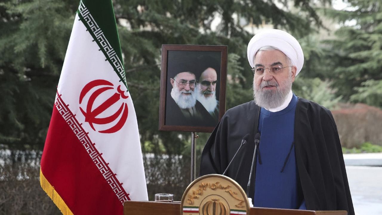 In this photo released on Saturday March 20, 2021 by the official website of the office of the Iranian Presidency, President Hassan Rouhani delivers a message. Credit: AP/PTI.