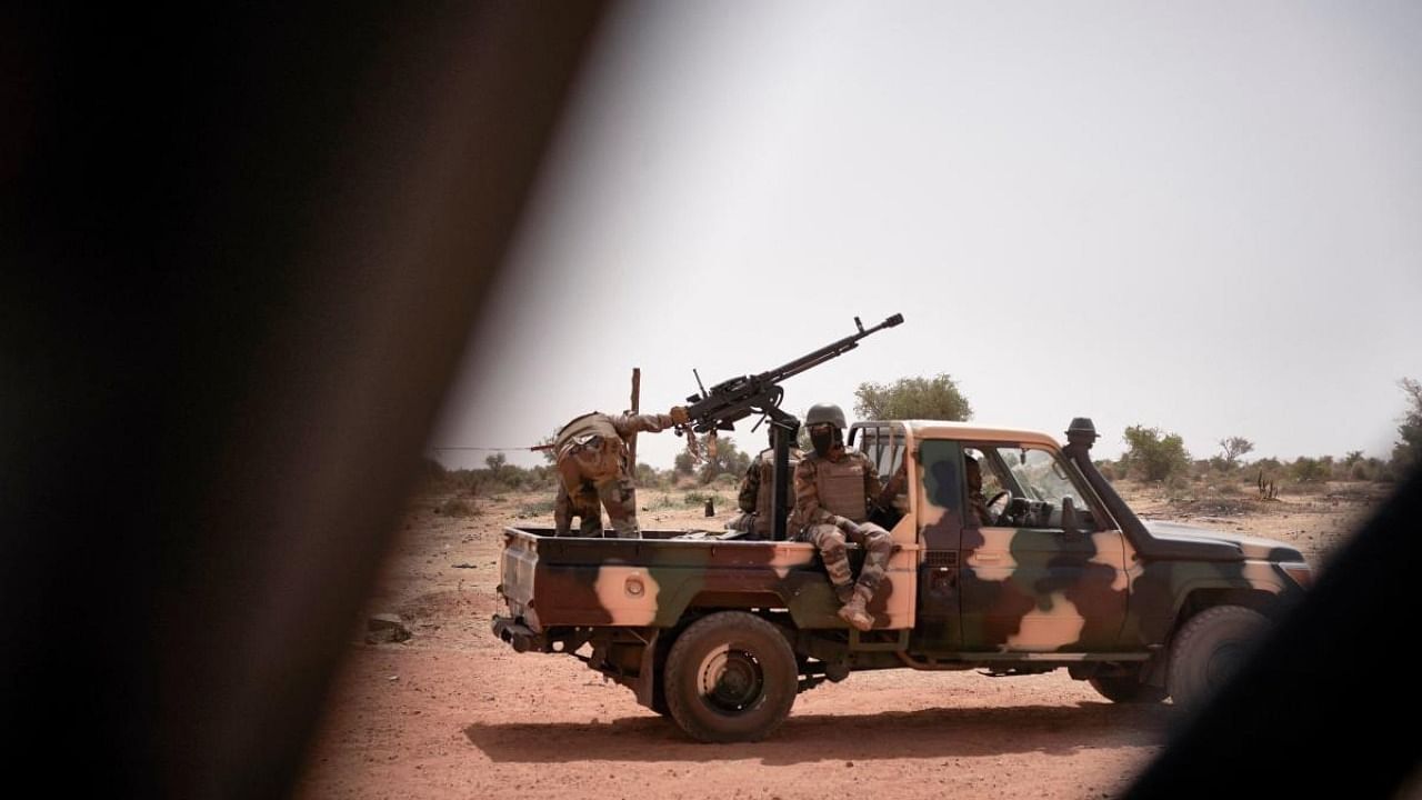 A Malian Army pick-up truck patrols the town of Konna. Credit: AFP.