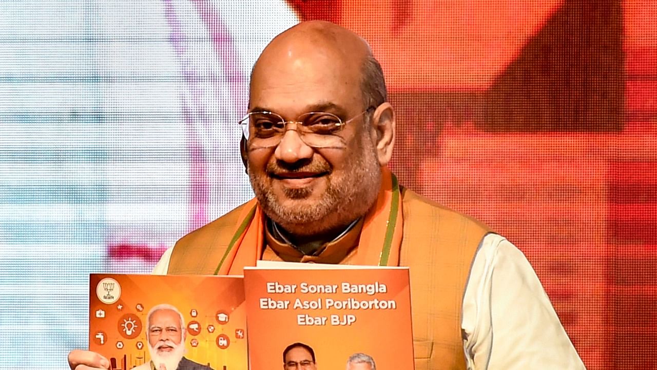 Union Home Minister and BJP leader Amit Shah releases party manifesto, ahead of West Bengal assembly polls, in Kolkata. Credit: PTI Photo
