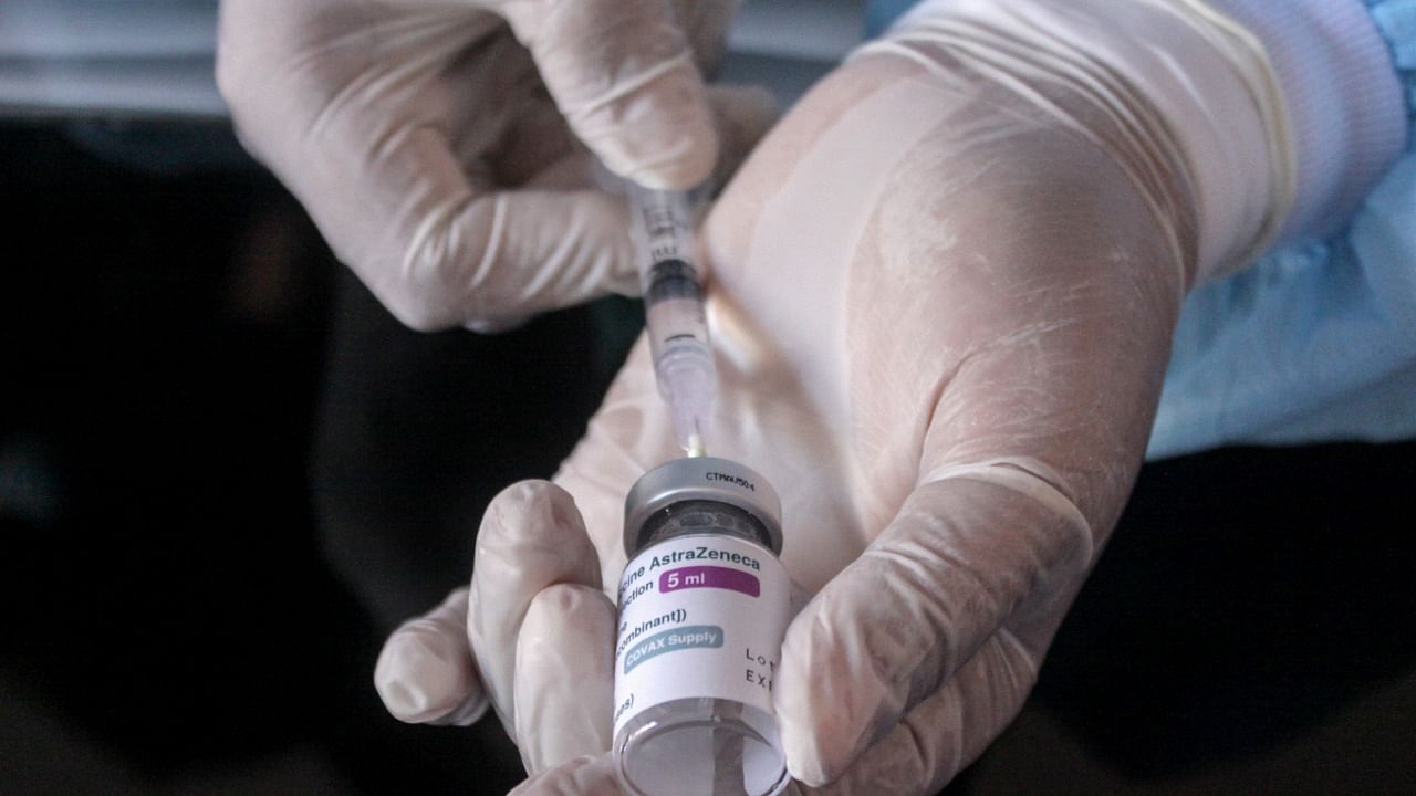 A healthcare worker prepares a dose of AstraZeneca Covid-19 vaccine. Credit: Reuters Photo